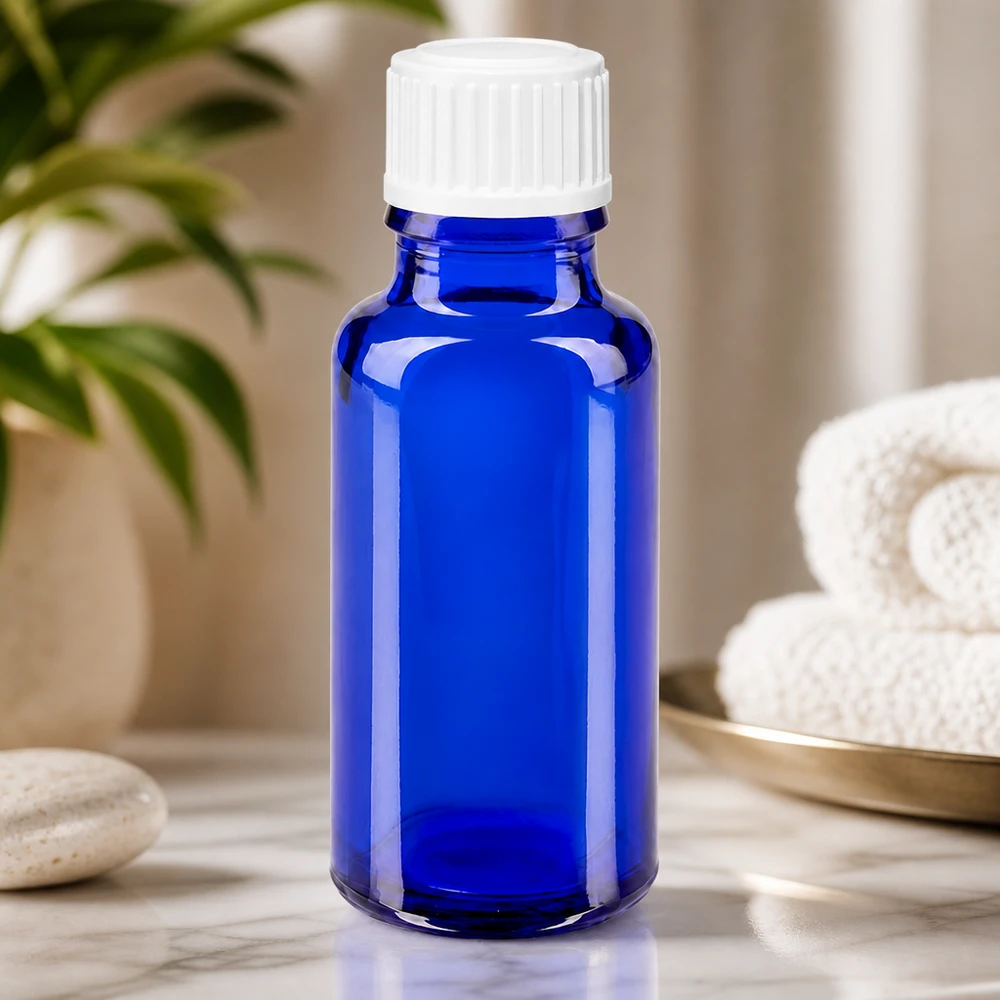 Blauwe glazen fles van 20 ml voor etherische oliën en farmaceutische producten, met standaarddop