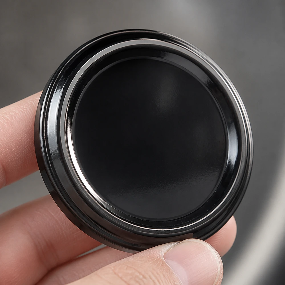 UNiTWIST TO48 BPA-NI zwarte miniatuurdeksel 48 mm BioSeal, handzaam formaat, detailfoto