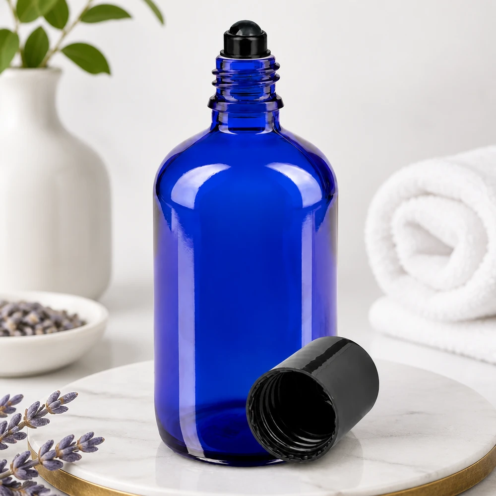 Blauw apothekersglas van 100 ml met rolluikje voor aromatherapie en lichaamsverzorging