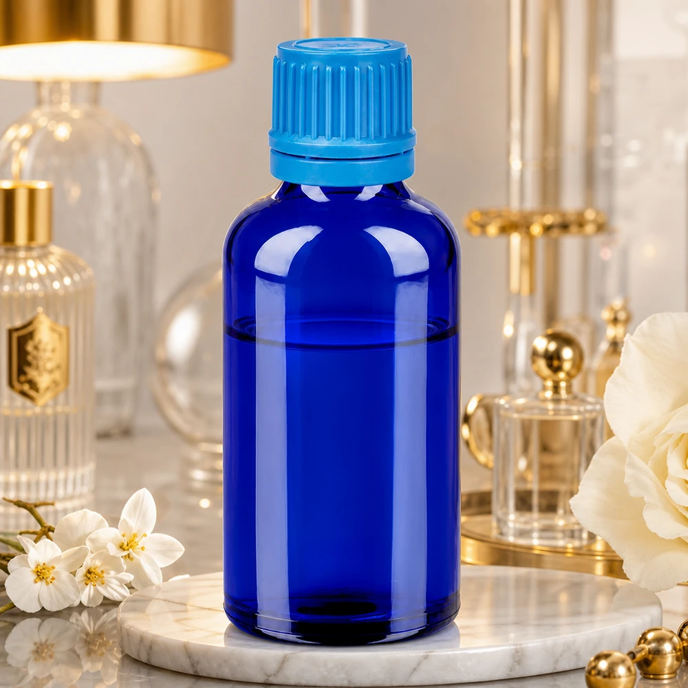 Praktische glazen fles van 50 ml in kobaltblauw met ergonomisch ontwerp voor eenvoudig gebruik