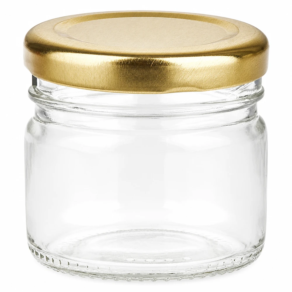 Helder, cilindrisch rond glas van 33 ml met een goudglanzende schroefdop, geschikt voor levensmiddelen