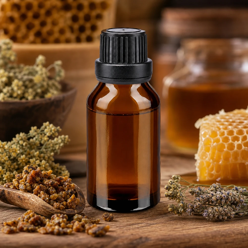 Lichtbestendig druppelflesje van 15 ml met zwarte dop voor propolis en bijenproducten
