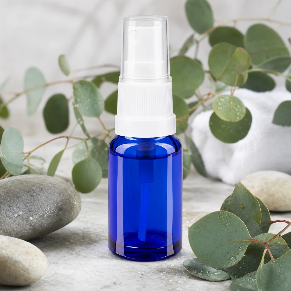 Hervulbare apothekersspuitfles van 10 ml, van blauw glas met een doorzichtige spuitkop
