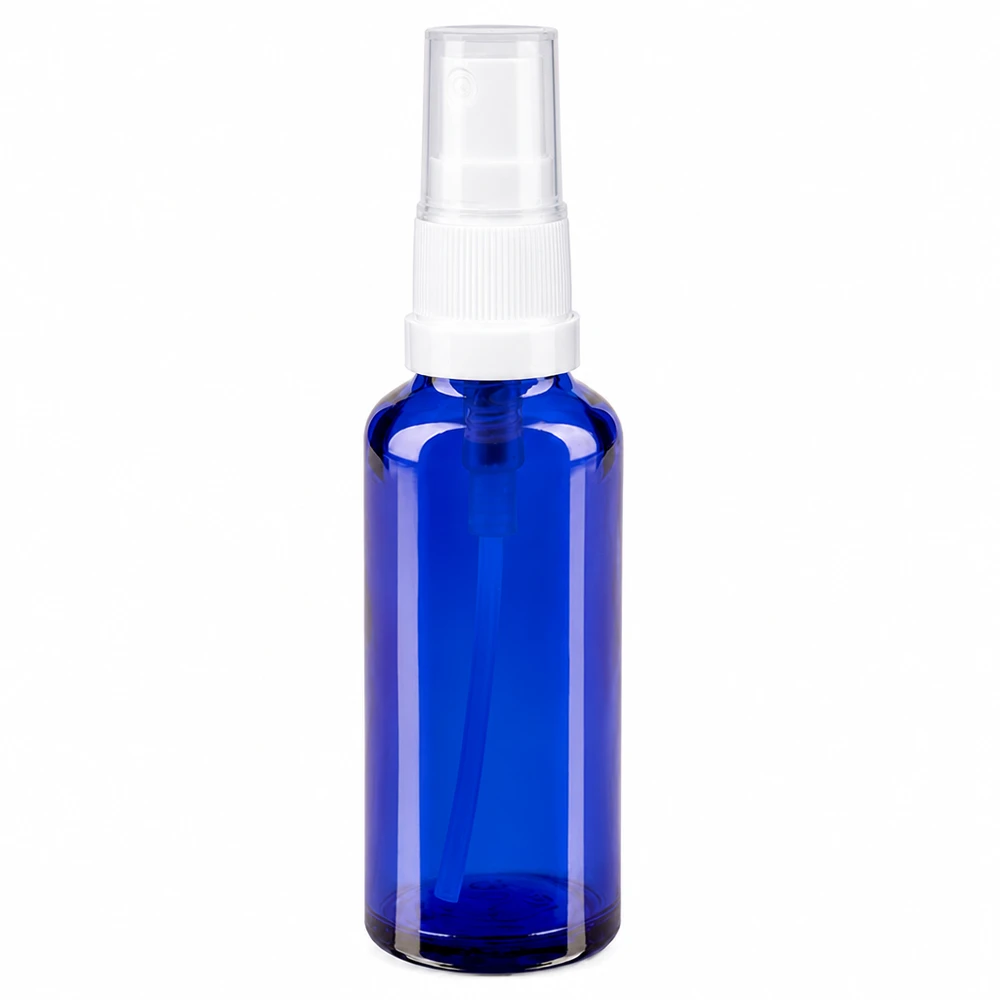 Kobaltblauwe glazen fles van 10 ml met een doorzichtige verstuiver en een witte pompkop