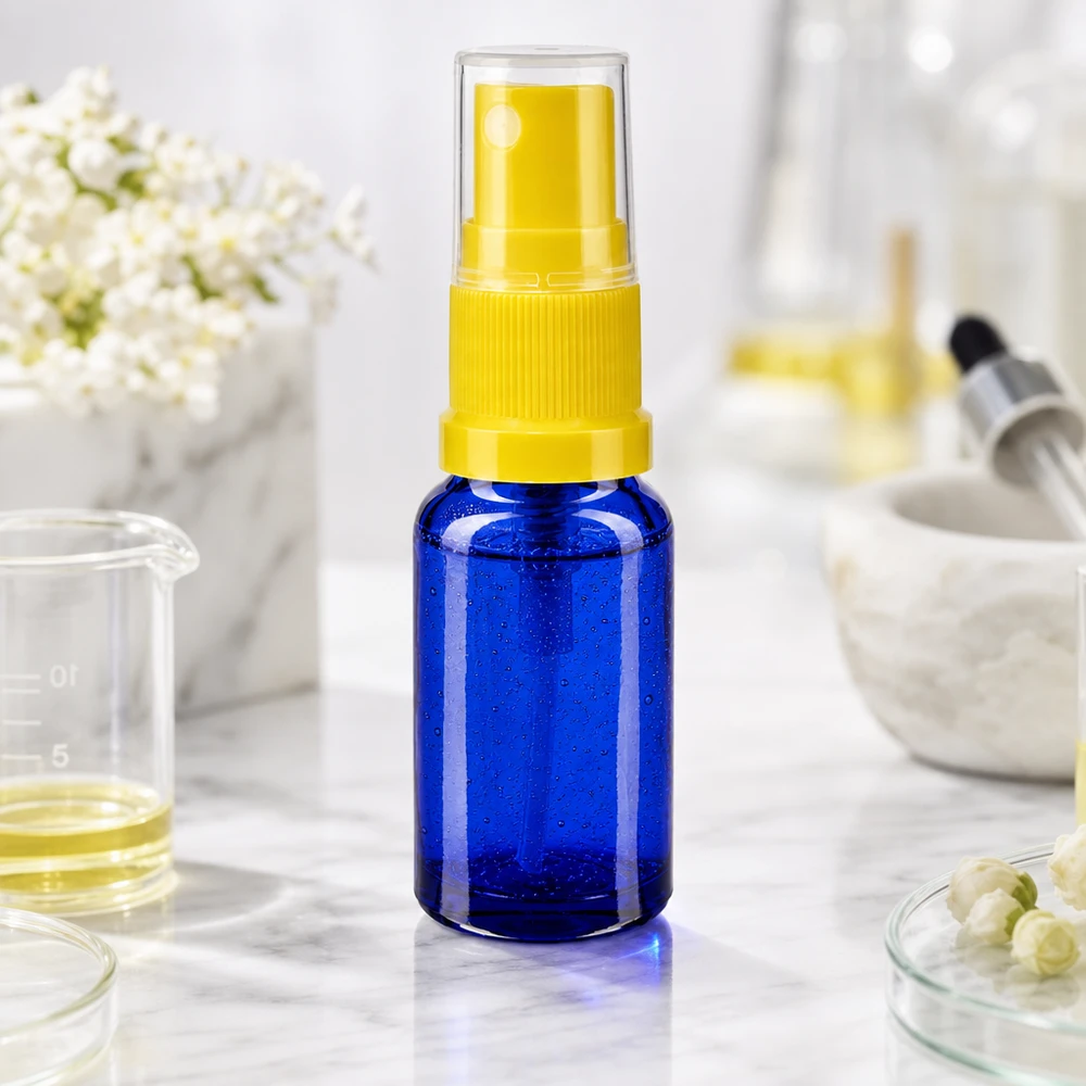 Blauwe glazen flessen 30ml met geel pompverstuiver Farmaceutische spuitfles van 30 ml, blauw glas met doorzichtige dop en gele verstuiver