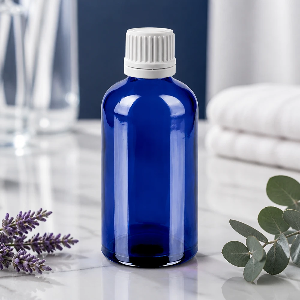 Precies druppelflesje 100ml van robuust blauw glas met kindveilige witte dop