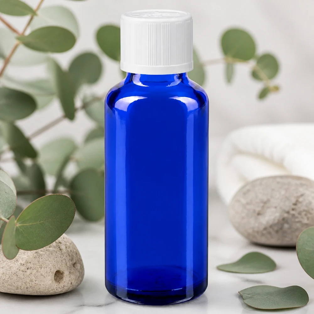 Blauwe druppelfles van 30 ml van UV-bestendig glas met KiSi-dop voor aromatherapie en natuurlijke cosmetica