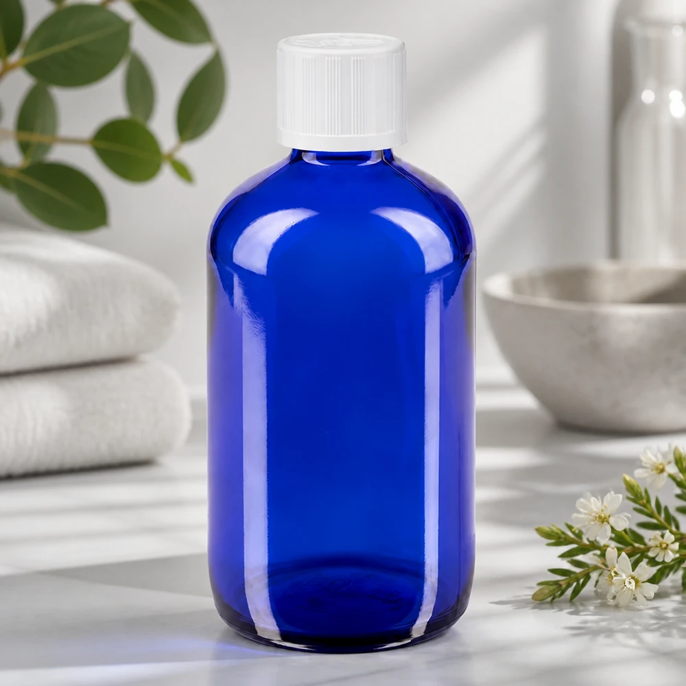 Blauwe glazen flessen 100ml met wit druppelsluiting kinderslot St Blauwe glazen fles van 100 ml met druppelaar van 1,2 mm voor cosmetische serums en natuurlijke producten