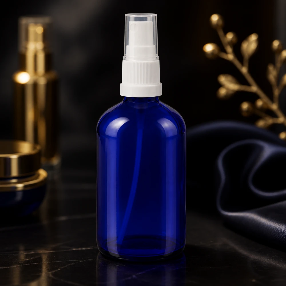 Hoogwaardige spuitfles van 100 ml, apothekersglas, blauw met witte doserdop, voor aromaspays