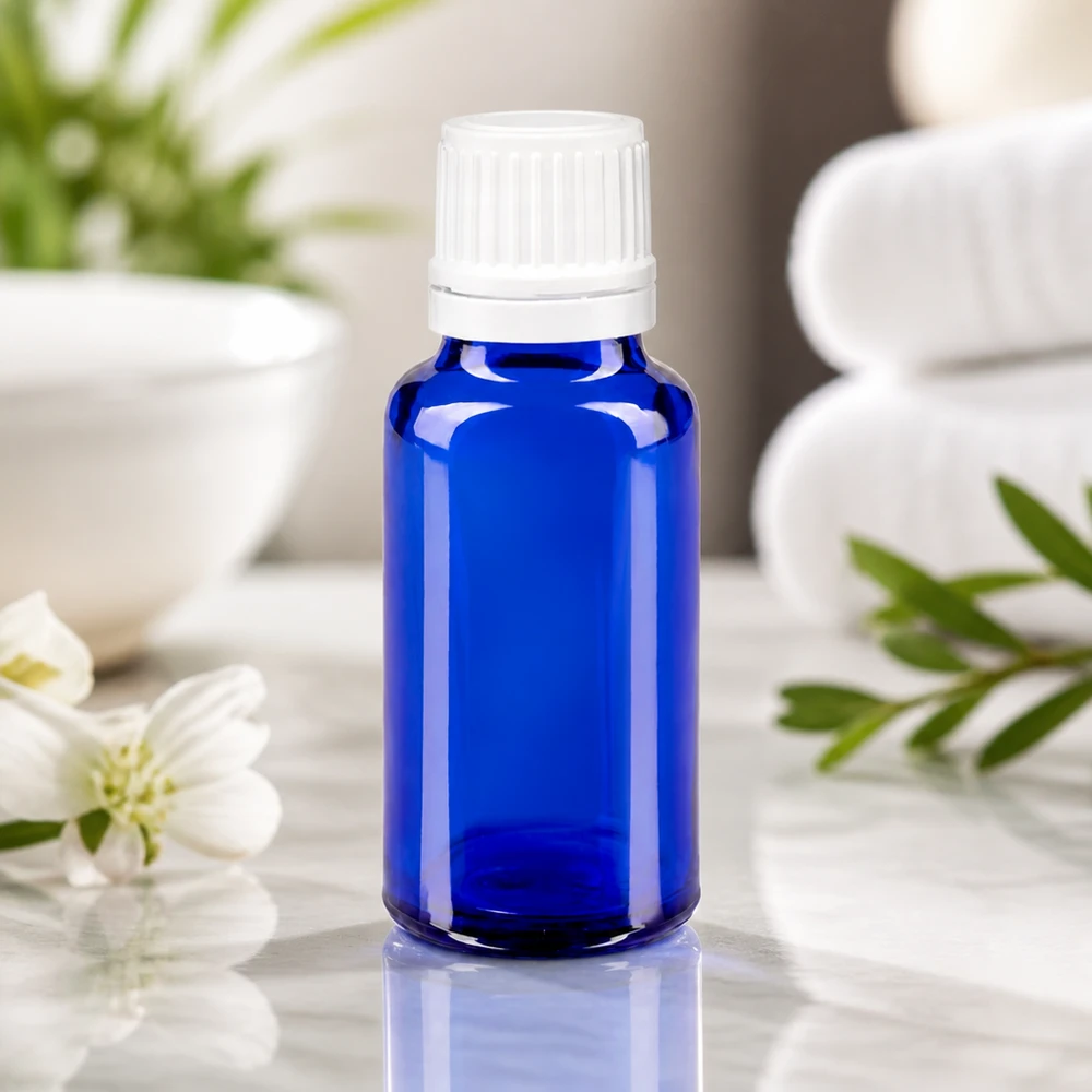 Precisie-doseerflesje van 20 ml van UV-bestendig glas in blauw met een witte verzegeling van 0,7 mm