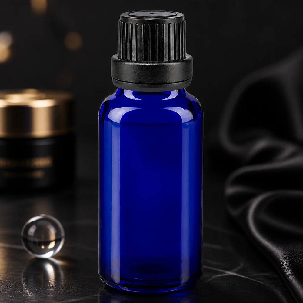 Donkerblauw glazen flesje van 20 ml met een nauwkeurige druppelaar van 2 mm voor etherische oliën en farmaceutische producten