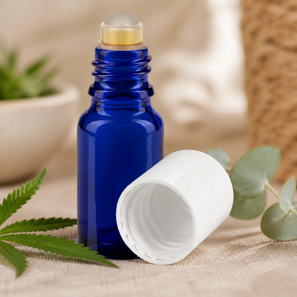 Glazen roll-on-flesje van 10 ml in blauw met witte dop voor etherische oliën en CBD-toepassingen