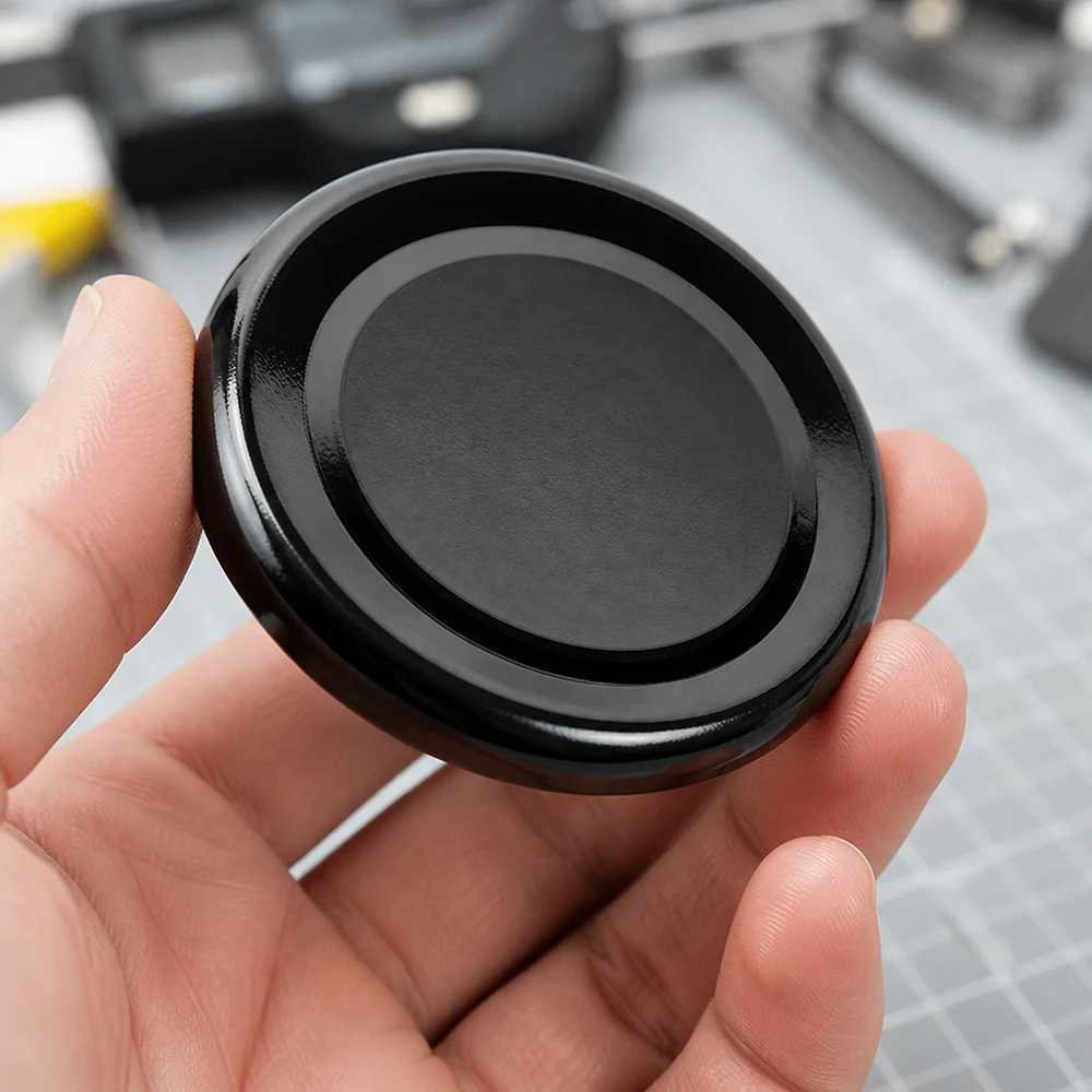 Zwarte schroefdop van 66 mm BasicSeal TO66deep UNiTWIST, ronde vorm, bovenaanzicht, handformaat
