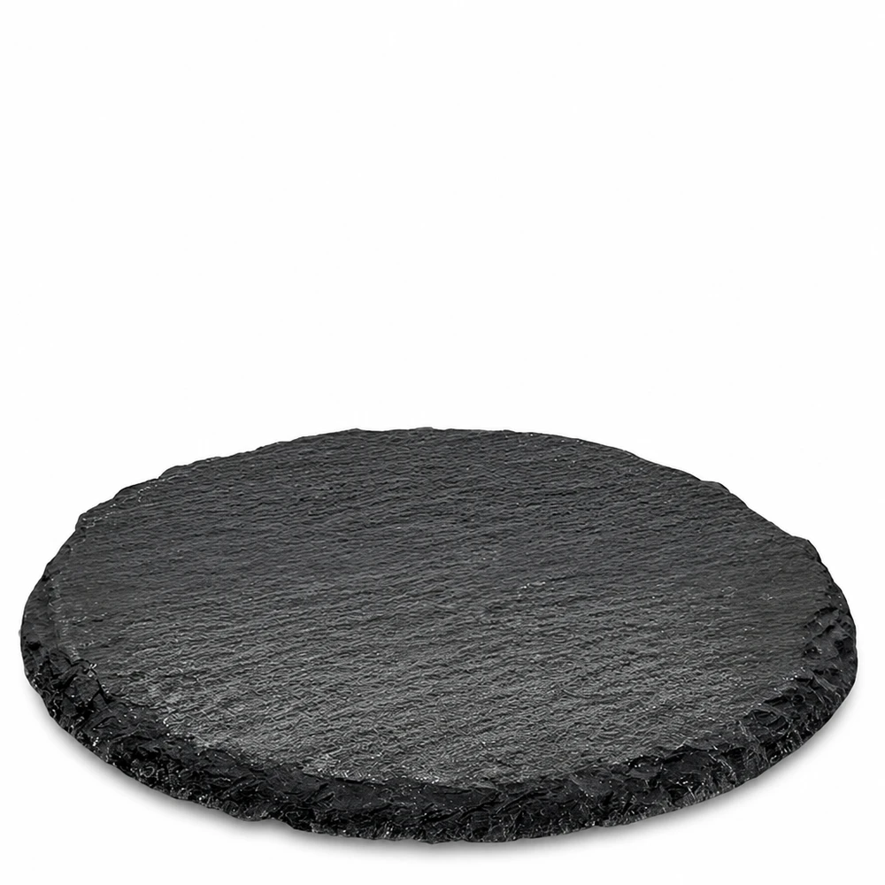 Ronde schaal van zwart leisteen met een diameter van 15 cm als serveerschaal met een natuurstenen textuur en ruwe rand