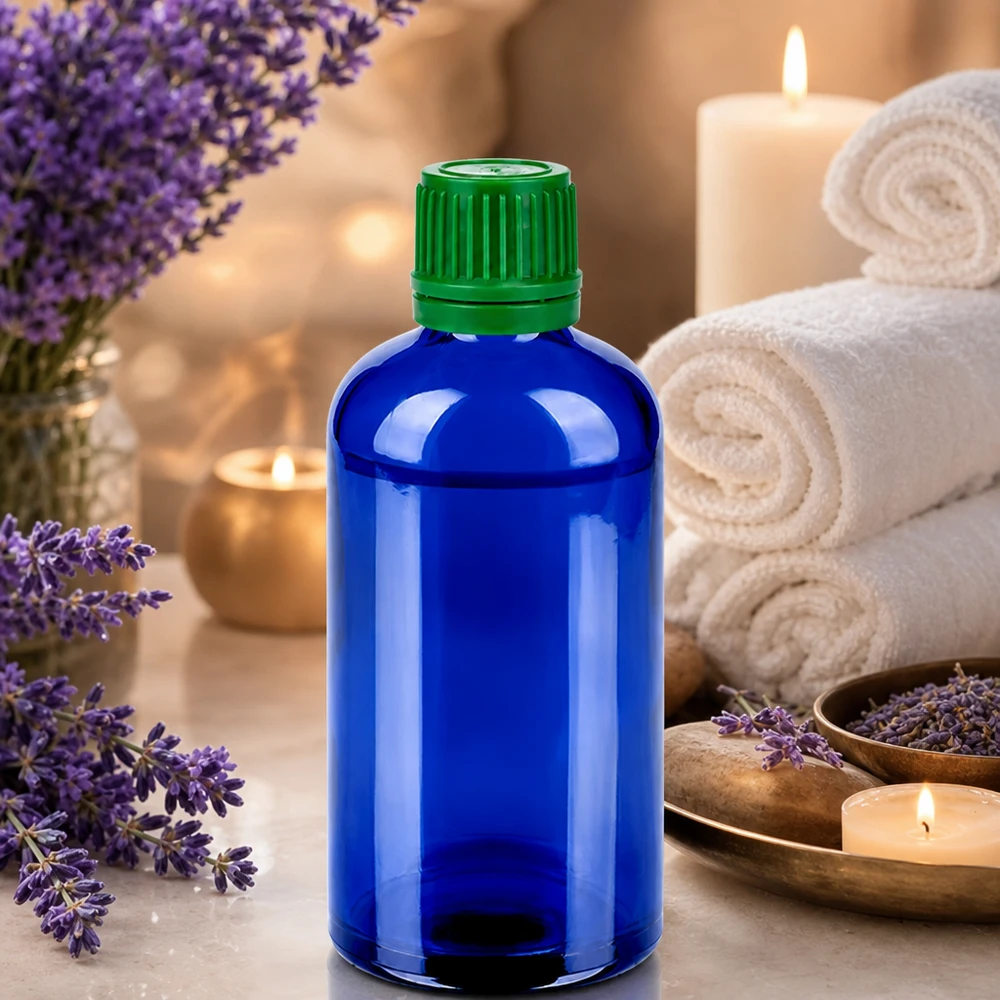 Compacte 100 ml fles in elegant blauw met groene dop voor mobiele toepassingen