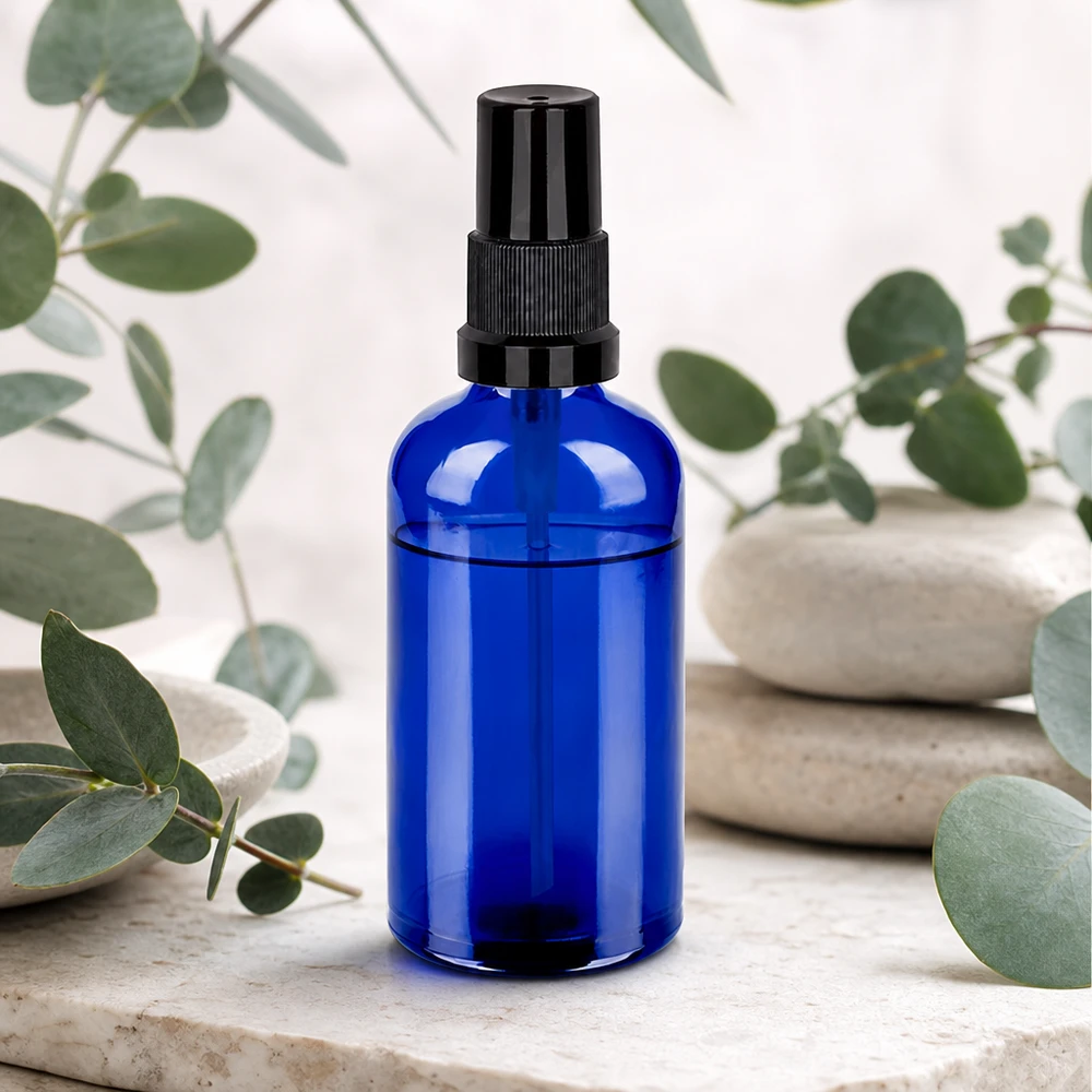 100 ml blauwe glazen fles met sprayopzetstuk - compact formaat voor op reis en onderweg