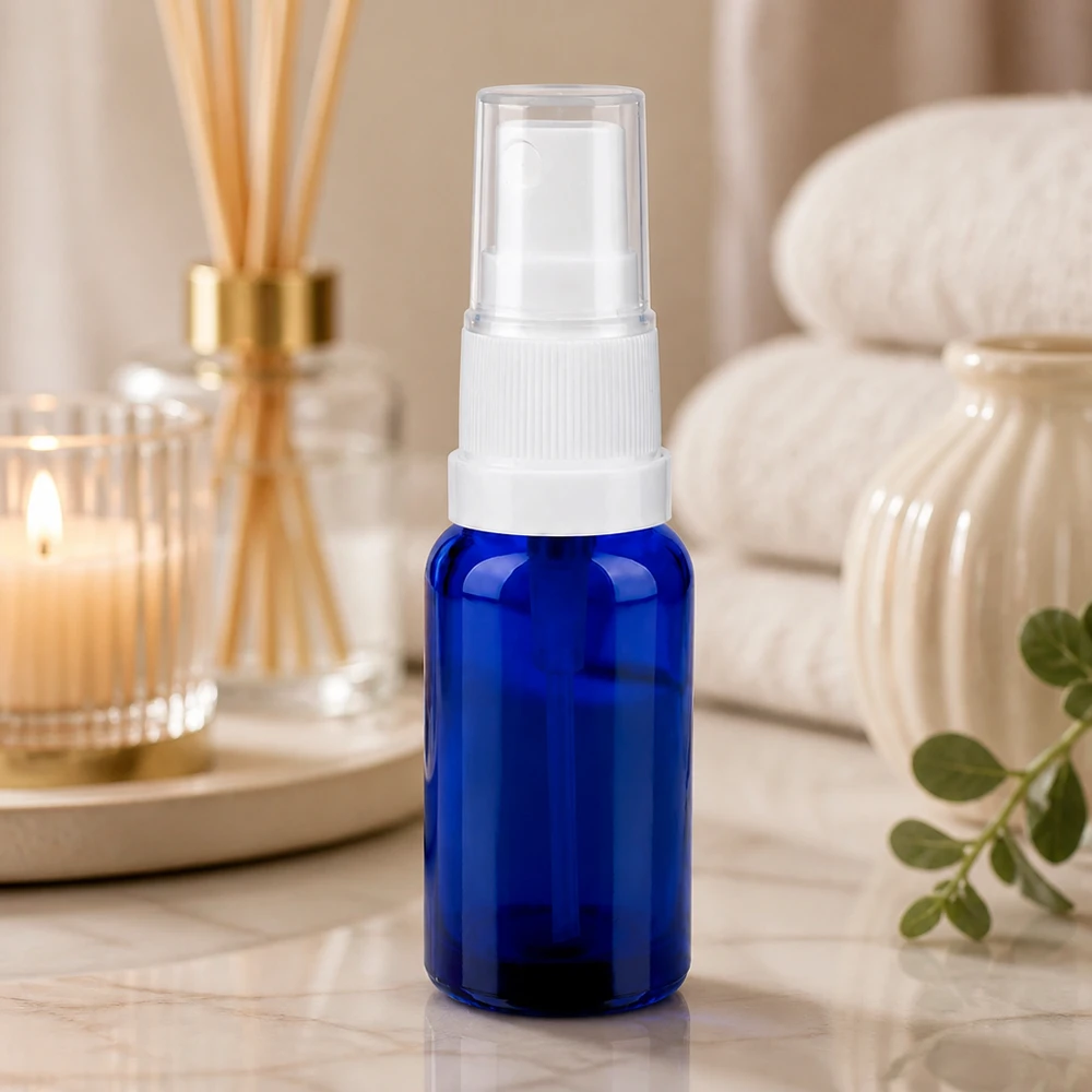 20 ml blauw glazen flesje met sproeipomp en transparante beschermdop STD-draad