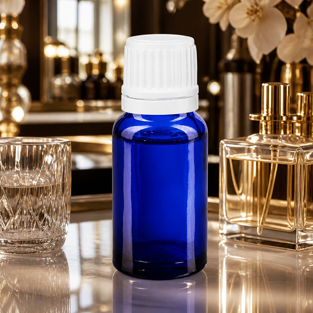 Compacte apothekersfles van 10 ml van blauw glas voor parfumoliën en essences, met OV-sluiting