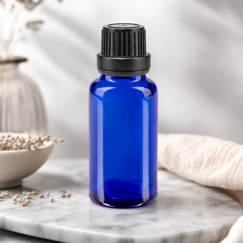 Apothekersflesje van 20 ml, blauw glas, slanke cilindrische vorm met zwarte originaliteitssluiting