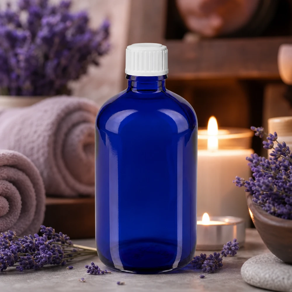 Blauwe glazen flessen 100ml met wit druppelsluiting 0.8mm St Blauwe fles van 100 ml met UV-bescherming en een witte dop voor gevoelige etherische oliën
