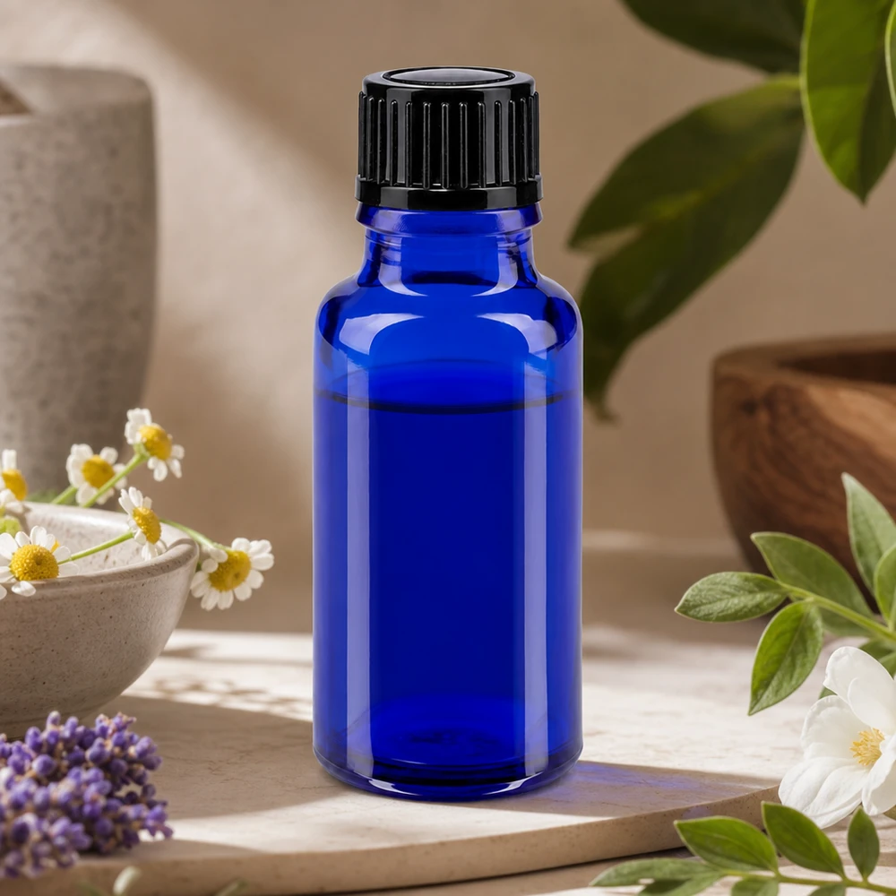 Blauwe glazen flessen 20ml met zwart schroefsluiting St Lichtbeschermende blauwe glazen fles van 20 ml met een zwarte dop van 11 mm voor essences