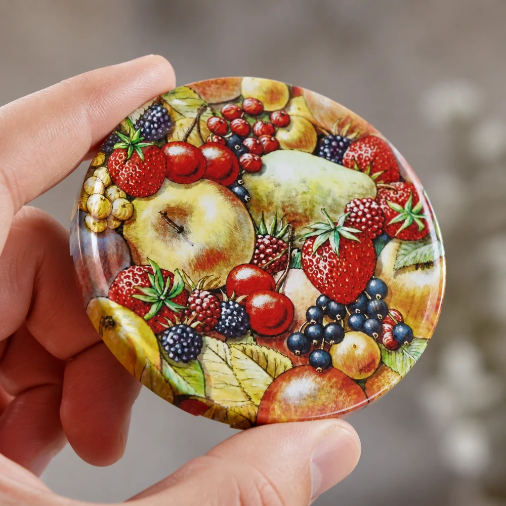 82 mm BasicSeal-deksel met fruitmotief (TO82) UNiTWIST UNiTWIST TO82 deksel 82 mm met traditioneel fruitmotief voor inmaakpotten en voorraadpotten