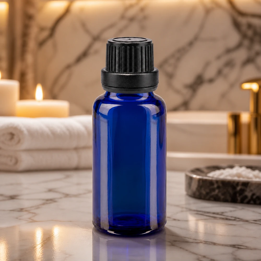 Blauwe glazen flessen 20ml met zwart schroefsluiting VR Blauwe fles met opgerolde rand van 20 ml, gemaakt van borosilicaatglas, met een zwarte originaliteitssluiting van 11 mm