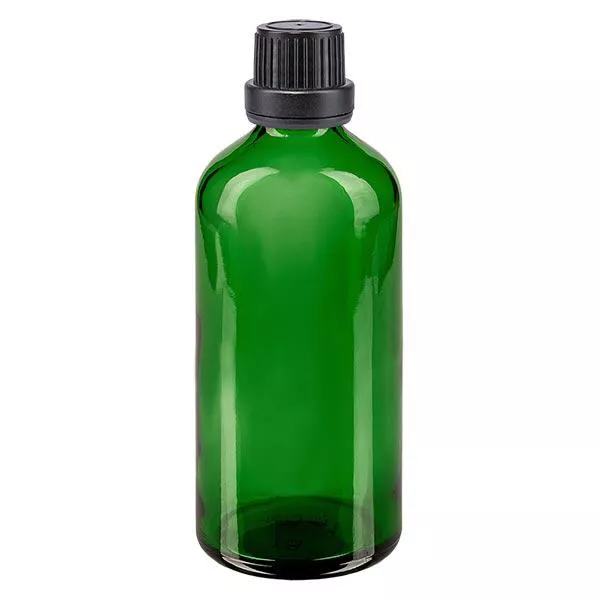 Groenen glazen flessen 100ml met zwart schroefsluiting dicht. VR Groenen glazen flessen 100ml met zwart schroefsluiting dicht. VR