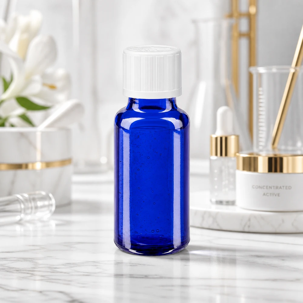 Blauw apothekersflesje van 20 ml met druppelaar en witte schroefdop van 11 mm