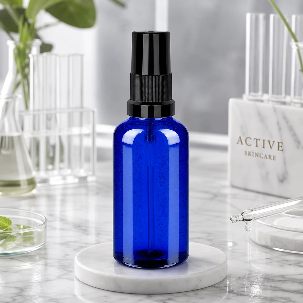 50ml spuitfles zwart STD BlueLine UT18/50 Elegante 50ml sprayflacon in kobaltblauw met zwarte verstuiver voor een gelijkmatige verdeling