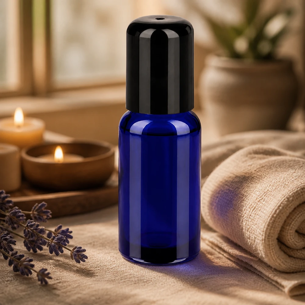 Elegant kobaltblauw glazen flesje 20ml met precieze roll-on applicator voor plaatselijk aanbrengen
