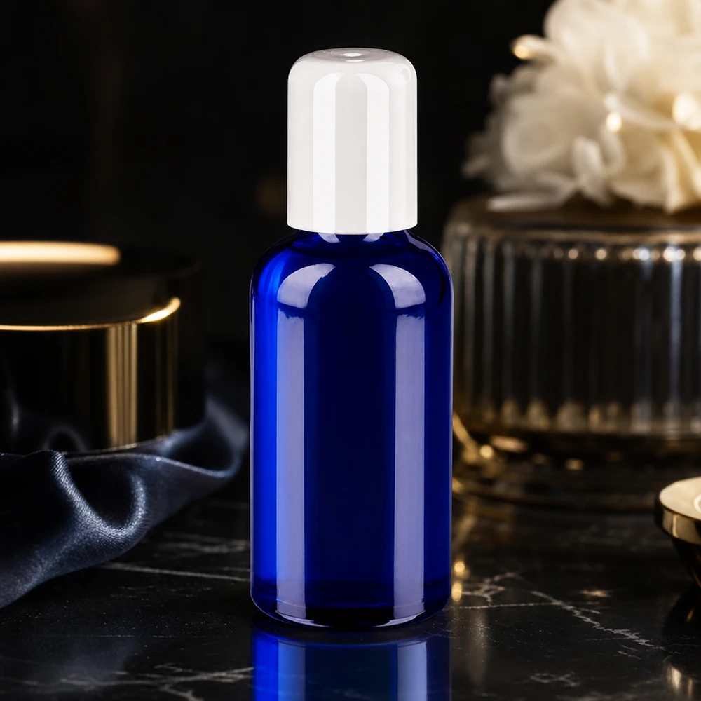 50ml roll-on houder van robuust glas in diepblauw met hygiënische witte dop