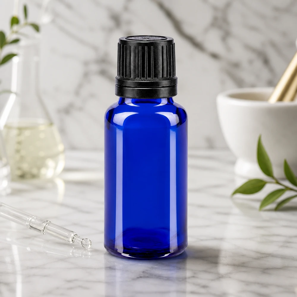 Handzaam serumflesje van 20 ml, gemaakt van blauw veiligheidsglas met een geribbelde originaliteitsdop