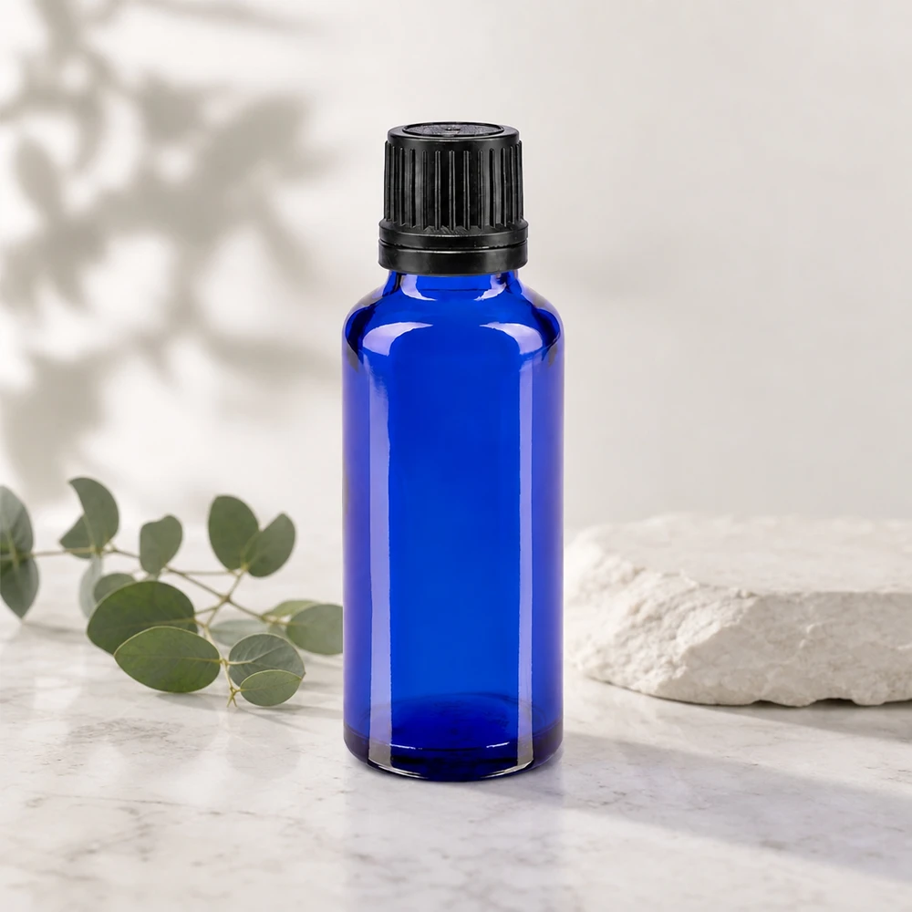 Hoogwaardig blauw glazen flesje van 30 ml met kindveilige druppeldop voor oliën