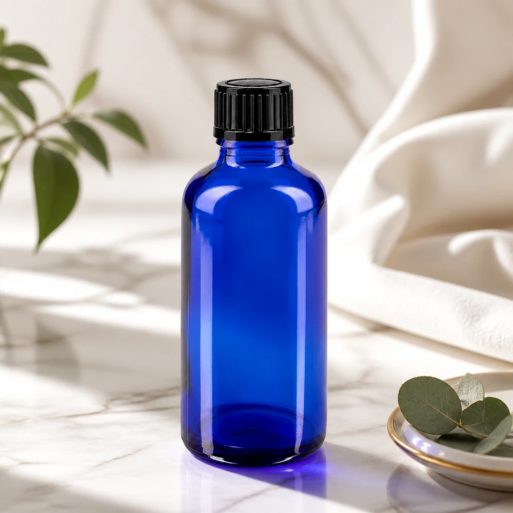 Blauwe glazen fles van 50 ml met zwarte druppeldop voor etherische oliën en farmaceutische producten