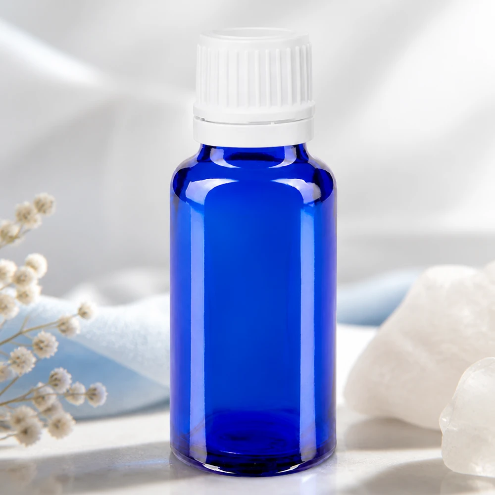 Blauwe glazen flessen 20ml met wit sluiting OV Blauw farmaceutisch glazen flesje van 20 ml met fraudebestendige OV-sluiting voor natuurlijke cosmetica en essences