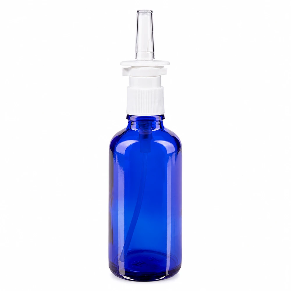 Blauwe glazen flessen 50ml met neusverstuiver Farmaceutische glazen fles van 50 ml in blauw met steriele neusspraykop voor medisch gebruik