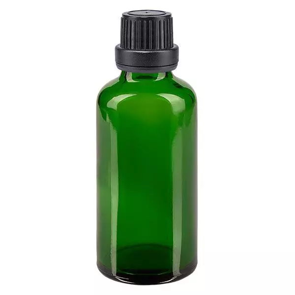 Groenen glazen flessen 50ml met zwart schroefsluiting dicht. VR Groenen glazen flessen 50ml met zwart schroefsluiting dicht. VR