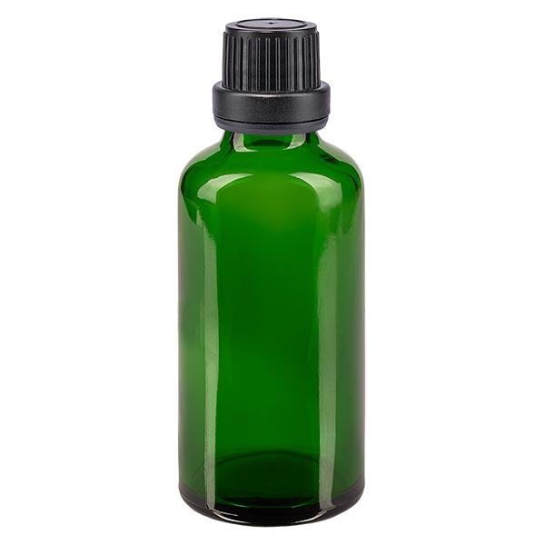 Groenen glazen flessen 50ml met zwart schroefsluiting dicht. VR Groenen glazen flessen 50ml met zwart schroefsluiting dicht. VR