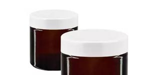 Glazen pot bruin met witte deksel