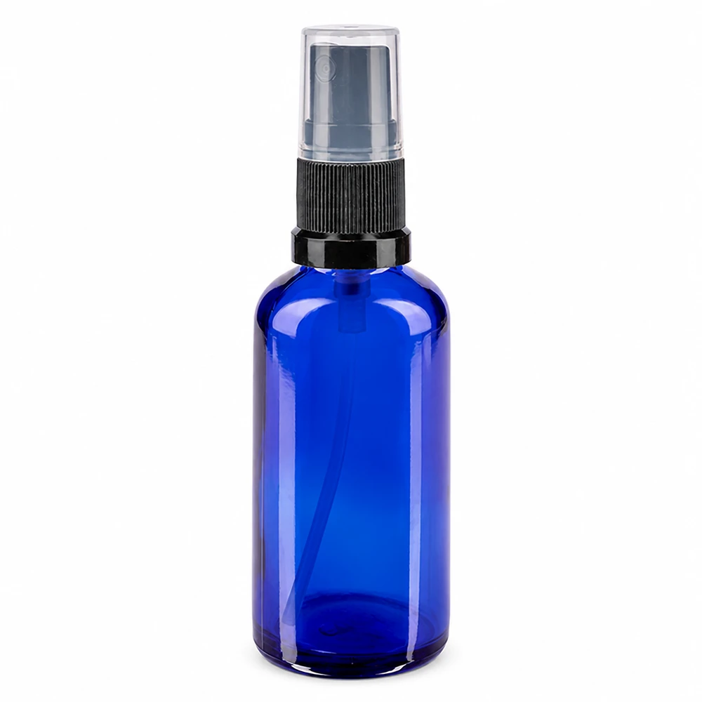 Kleine blauwe glazen fles van 50 ml met verstuiver voor fijnnevel, voor cosmetica en aromatherapie