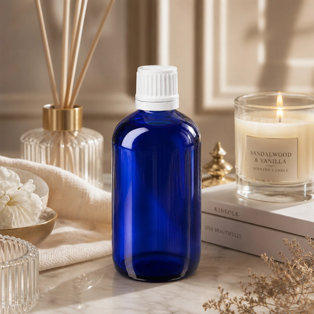 Blauwe fles met ronde schouders, 100 ml, glas, met witte schroefdop, voor etherische oliën en aromatherapie