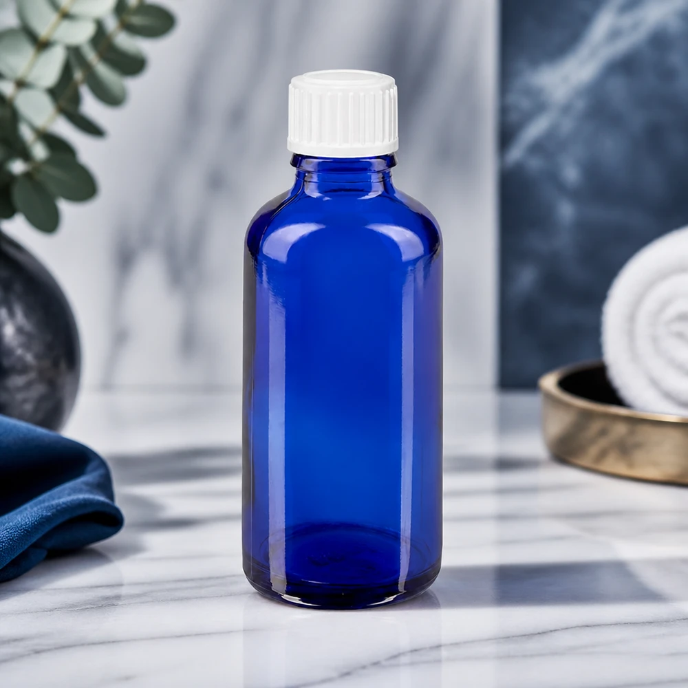 Lichtbestendige fles van 50 ml, blauw met witte druppeldop, voor etherische oliën en medicijnen