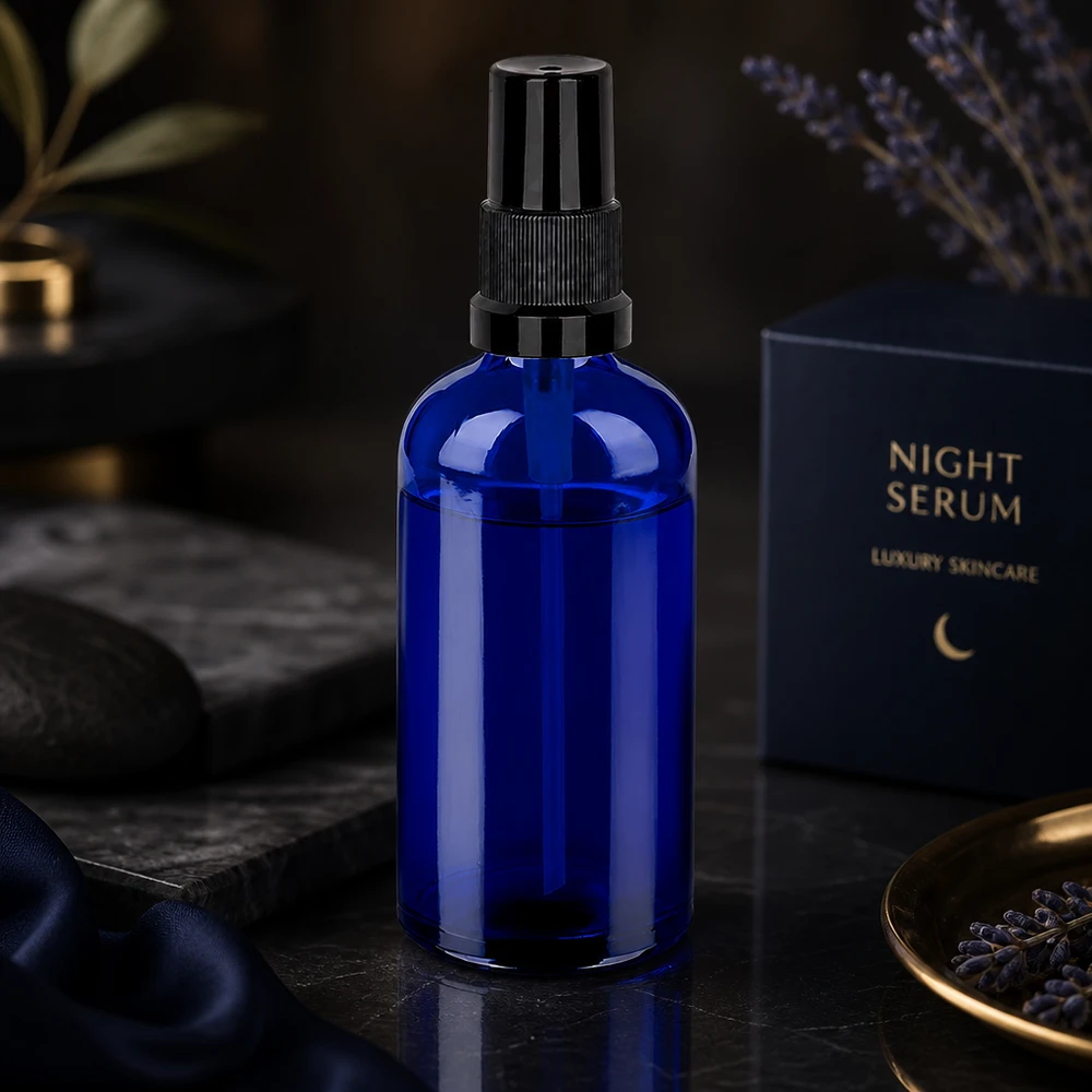 100ml spuitfles zwart STD BlueLine UT18/100 Elegante glazen spuitfles 100ml in blauw met matzwart pompsysteem - STD BlueLine UT18/100