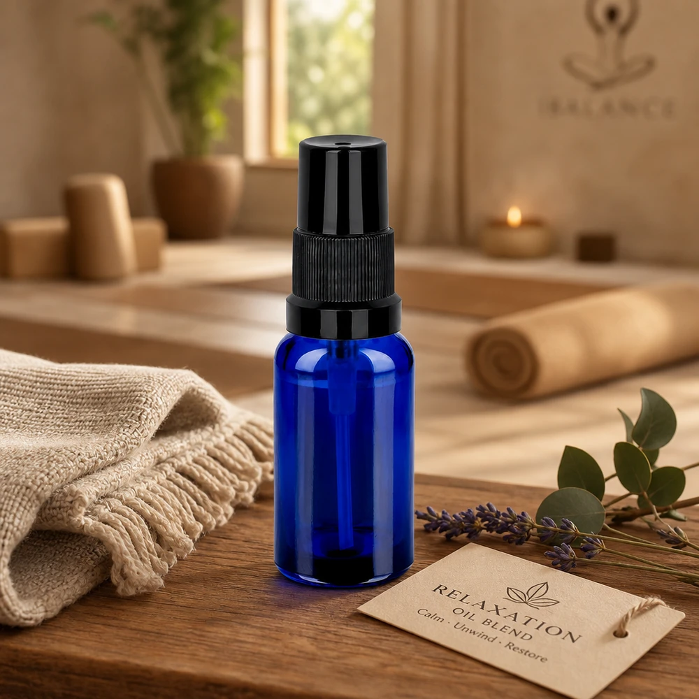 Duurzame 20 ml spuitfles van dik blauw glas met corrosiebestendig zwart spuitsysteem