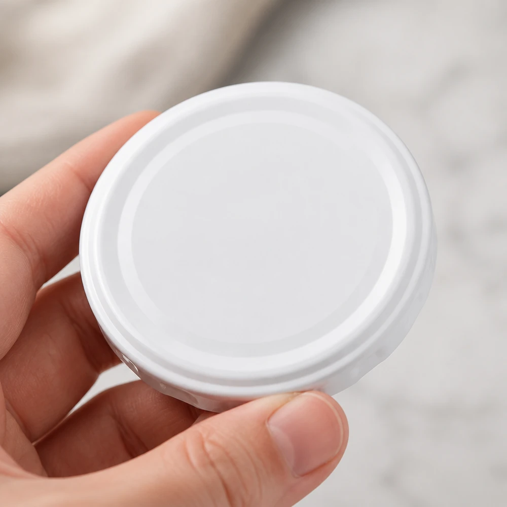 Compacte witte twist-off-dop met een diameter van 58 mm, TO58deep BasicSeal UNiTWIST, detailweergave