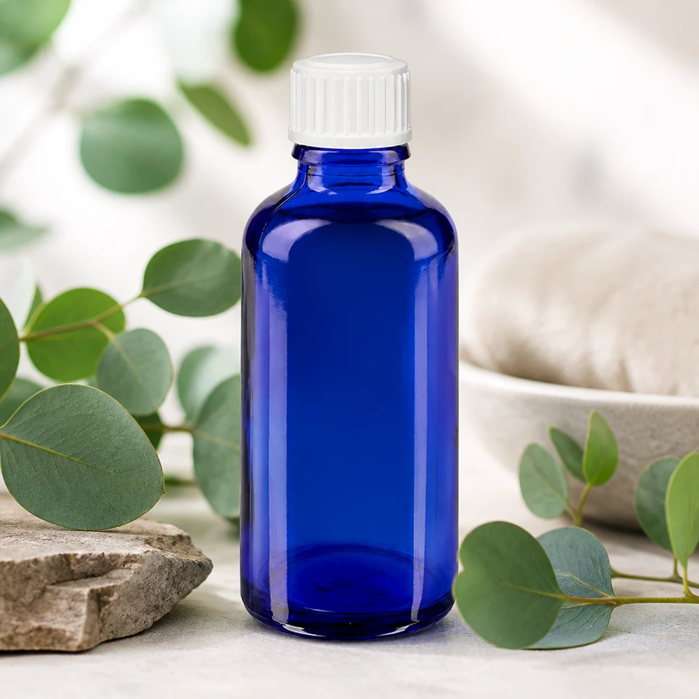 Blauwe glazen flessen 50ml met wit druppelsluiting 0.8mm St Farmaceutische druppelfles van 50 ml van blauw veiligheidsglas met een witte doseerdop van 0,9 mm