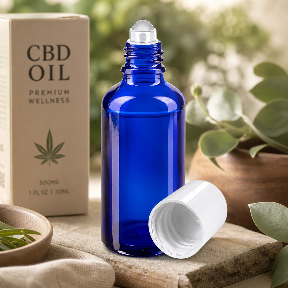 Hervulbare blauwe roll-onfles van 50 ml van UV-bestendig glas voor etherische oliën en wellnessproducten