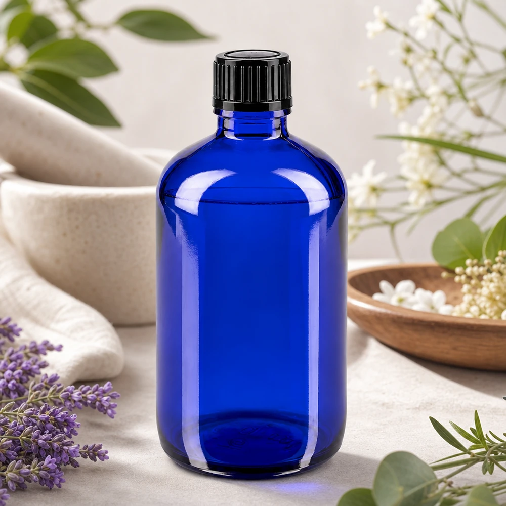 Blauw flesje van 100 ml van UV-bestendig glas met schroefdop voor etherische oliën