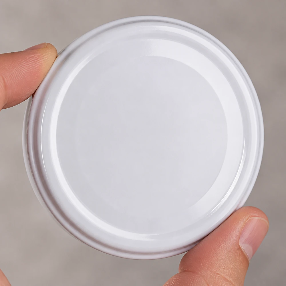UNiTWIST TO43 wit, BioSeal, BPA-NI, unitemp UNiTWIST TO43 wit deksel voor conservenblikken, unitemp, geëmailleerde binnenkant, close-up